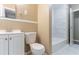 Bathroom features a white tub, white vanity, tiled floors and access to a shower at 881 Mercury Nw Dr, Atlanta, GA 30331