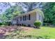 A beautiful single-story home with well-maintained landscaping and traditional design elements at 881 Mercury Nw Dr, Atlanta, GA 30331