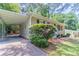 Lovely single-story home featuring a convenient covered carport and charming curb appeal at 881 Mercury Nw Dr, Atlanta, GA 30331