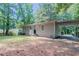 The exterior of this home features a carport and a front entrance with a small porch at 881 Mercury Nw Dr, Atlanta, GA 30331