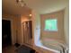 Bathroom showcasing a soaking tub, neutral-toned walls, and a shower featuring a glass door at 12351 Styron Dr, Hampton, GA 30228