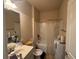 Bathroom with a shower-tub combo and tile floors at 12351 Styron Dr, Hampton, GA 30228