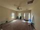 Inviting living room with natural light and neutral paint, creating a warm atmosphere at 12351 Styron Dr, Hampton, GA 30228