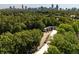 Aerial view showing the tree coverage and skyline views from the home at 1445 Monroe Ne Dr # C13, Atlanta, GA 30324