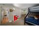 Bedroom boasts a bunk bed, toy shelves, and a window overlooking a garden at 1445 Monroe Ne Dr # C13, Atlanta, GA 30324