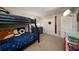 This bedroom has a bunk bed, blue dresser, and closet with a shelf at 1445 Monroe Ne Dr # C13, Atlanta, GA 30324