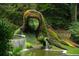 Stunning botanical gardens feature a living sculpture and flowing water feature, creating a serene outdoor oasis at 1445 Monroe Ne Dr # C13, Atlanta, GA 30324