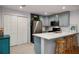 Well-lit kitchen with quartz countertops, modern appliances, and plenty of storage space at 1445 Monroe Ne Dr # C13, Atlanta, GA 30324