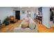 Stylish living room with a comfortable couch, hardwood floors, and modern accents at 1445 Monroe Ne Dr # C13, Atlanta, GA 30324