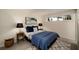 Cozy bedroom featuring a comfortable bed, stylish decor, and a window for natural light at 1445 Monroe Ne Dr # C13, Atlanta, GA 30324