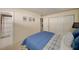 Bedroom featuring a closet and ensuite bathroom providing convenience and privacy at 1445 Monroe Ne Dr # C13, Atlanta, GA 30324