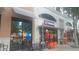 Commercial building with outdoor seating, large windows, and a modern facade at 2125 Jessica Way, Lithonia, GA 30058