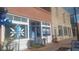 Exterior view of a building with a crystal shop, featuring large windows and a blue door at 2125 Jessica Way, Lithonia, GA 30058