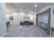 Sun-drenched living room featuring stylish furniture, vaulted ceilings, and generous natural light from expansive windows at 2125 Jessica Way, Lithonia, GA 30058