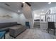 Living room with stairs, comfortable seating, and modern decor at 2125 Jessica Way, Lithonia, GA 30058