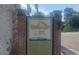 Sign with Stone Mountain Village information and map of the village at 2125 Jessica Way, Lithonia, GA 30058