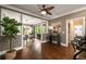 Inviting entryway with hardwood floors, a view into the dining room, and neutral-colored walls at 3390 River Ferry Dr, Alpharetta, GA 30022
