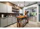 Beautiful kitchen with custom cabinets, butcher block island, and modern appliances at 3390 River Ferry Dr, Alpharetta, GA 30022