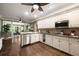 Bright kitchen features stainless steel appliances, white cabinets, wine cooler, and hardwood floors at 3390 River Ferry Dr, Alpharetta, GA 30022