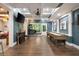 Basement recreation room with custom wall colors, a shuffleboard table, and game machines at 3390 River Ferry Dr, Alpharetta, GA 30022