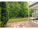 Spacious backyard patio with brick pavers, perfect for outdoor entertaining and relaxation at 4527 Village Springs Run, Dunwoody, GA 30338