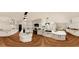 Modern kitchen with marble countertops, sleek white cabinets, and stainless steel appliances at 110 Serenity Pl, Fayetteville, GA 30214