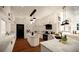 Modern kitchen with marble countertops, sleek white cabinets, and stainless steel appliances at 110 Serenity Pl, Fayetteville, GA 30214