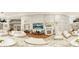 Spacious living room with large windows, fireplace, and modern decor at 110 Serenity Pl, Fayetteville, GA 30214