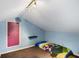 Cozy attic space with unique architectural features, a small window, and a simple layout at 1367 Ormewood Se Ave, Atlanta, GA 30316