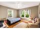 Bedroom with hardwood floors, natural light, and calming interior design at 1367 Ormewood Se Ave, Atlanta, GA 30316