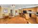 Spacious kitchen with central island, seating, wooden cabinets, and eat-in kitchen table at 1367 Ormewood Se Ave, Atlanta, GA 30316