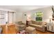Living room view featuring hardwood floors and cozy furniture at 1367 Ormewood Se Ave, Atlanta, GA 30316