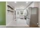 This well-equipped kitchen boasts stainless steel appliances, white cabinetry, and views out to the back yard at 2049 Rector Sw Dr, Atlanta, GA 30311