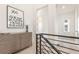Bright landing area with stylish chest of drawers and modern railing offering a functional space at 370 2Nd St, Fayetteville, GA 30214