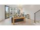 Bright living room boasting hardwood floors, large windows, and contemporary décor at 370 2Nd St, Fayetteville, GA 30214