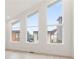 Sunlit room featuring large windows offering a view of the neighborhood at 370 2Nd St, Fayetteville, GA 30214