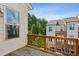 This home features a wood deck with views of the trees and back of the neighborhood at 4355 Parkside Pl, Sandy Springs, GA 30342