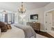 Relaxing main bedroom includes a chandelier, large windows, and ample closet space at 4355 Parkside Pl, Sandy Springs, GA 30342