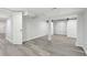 Finished basement showcases sliding barn door, flooring, and versatile open space at 623 Montevista Sw St, Atlanta, GA 30310