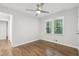 Cozy bedroom with hardwood floors, a ceiling fan, and natural light at 623 Montevista Sw St, Atlanta, GA 30310