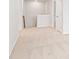 Upstairs hallway with carpet flooring and entryways to bedrooms at 7193 Brushwood Bend (Lot 33), Lithonia, GA 30058