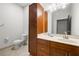 Bathroom with vanity, cabinets, and toilet creating a functional and clean space at 870 Mayson Turner Rd Nw # 1111, Atlanta, GA 30314