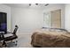 Bedroom with bed, desk, and window providing a cozy space at 870 Mayson Turner Rd Nw # 1111, Atlanta, GA 30314