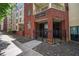 The Washington building entrance features brick accents and a secure gated entry at 870 Mayson Turner Rd Nw # 1111, Atlanta, GA 30314