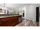 Stylish kitchen featuring granite counters, stainless steel appliances, and open design, flowing into the dining and living areas at 870 Mayson Turner Rd Nw # 1111, Atlanta, GA 30314