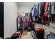 Spacious walk-in closet with shelving and ample storage space for clothes, shoes, and accessories at 870 Mayson Turner Rd Nw # 1111, Atlanta, GA 30314