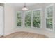 Cozy breakfast nook with natural light streaming through windows at 140 Longwater Cv, Roswell, GA 30075