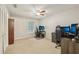 Bedroom includes a ceiling fan and a window, set up for gaming with computers at 2304 Country Park Se Dr, Smyrna, GA 30080