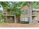 Inviting two-story townhome with cozy balconies nestled among mature trees and landscaped grounds at 2304 Country Park Se Dr, Smyrna, GA 30080