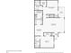 First floor plan with a living room, laundry room, and primary bedroom with a patio at 2304 Country Park Se Dr, Smyrna, GA 30080